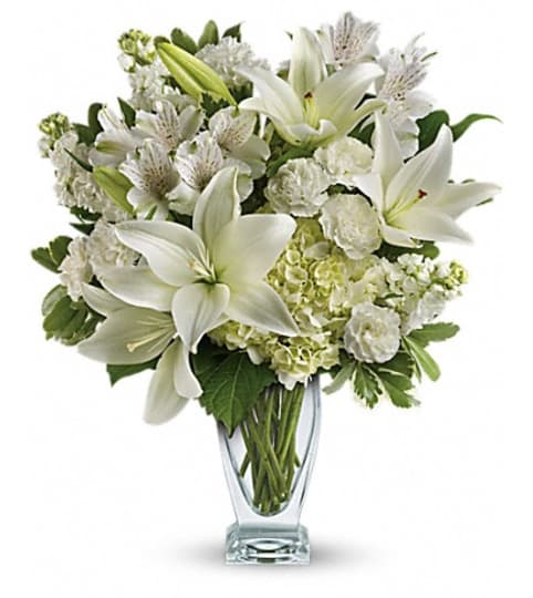 lovely white blooms. An arrangement by Fine's Flowers.