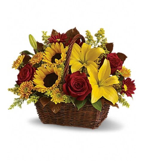 golden days basket. An arrangement by Fine's Flowers.