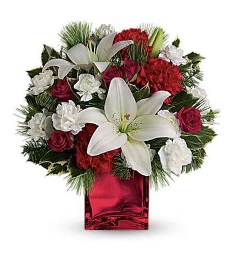 CAROLING IN THE SNOW. An arrangement by Fine's Flowers.