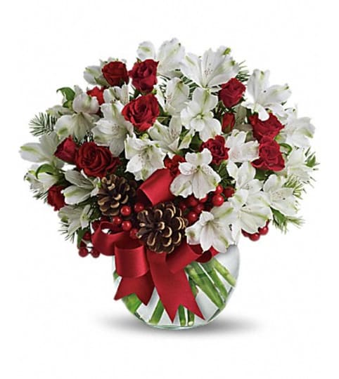 LET IT SNOW. An arrangement by Fine's Flowers.