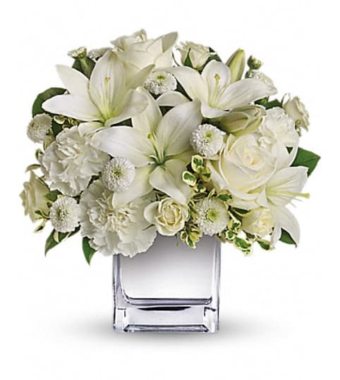 PEACE AND JOY BQT. An arrangement by Fine's Flowers.