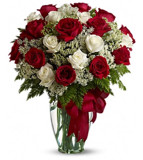 LOVE'S DEVINE BQT. An arrangement by Fine's Flowers.