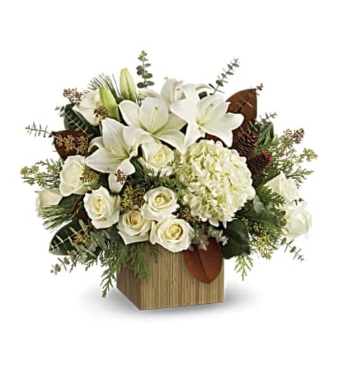 SNOWY WOODS. An arrangement by Fine's Flowers.