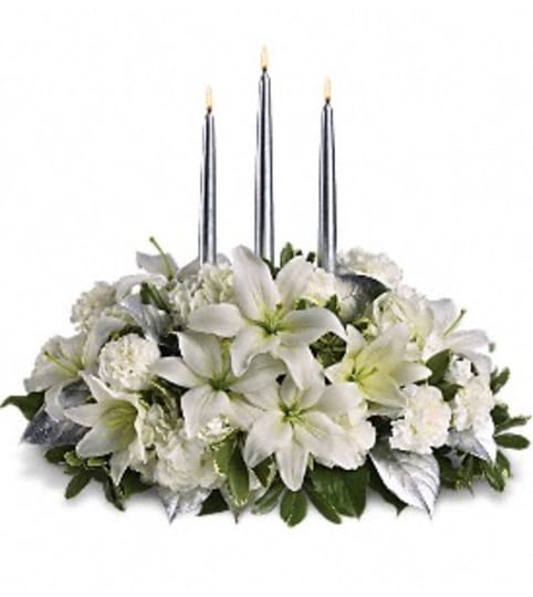 Luxurious white blooms. An arrangement by Fine's Flowers. Luxurious white blooms. An arrangement by Fine's Flowers.
