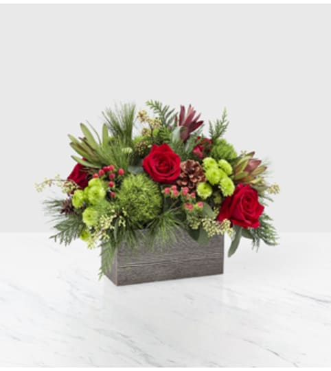 Christmas Cabin. An arrangement by Fine's Flowers. Christmas Cabin. An arrangement by Fine's Flowers.