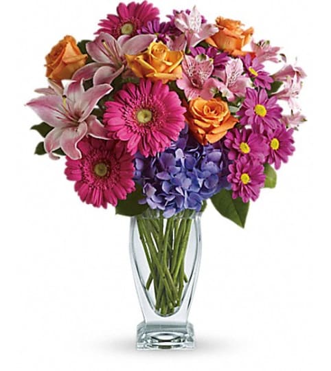 wild wishes. An arrangement by Fine's Flowers.