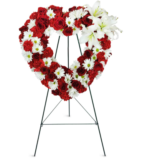 Rosy Remembrance Heart Wreath™. An arrangement by Fine's Flowers.