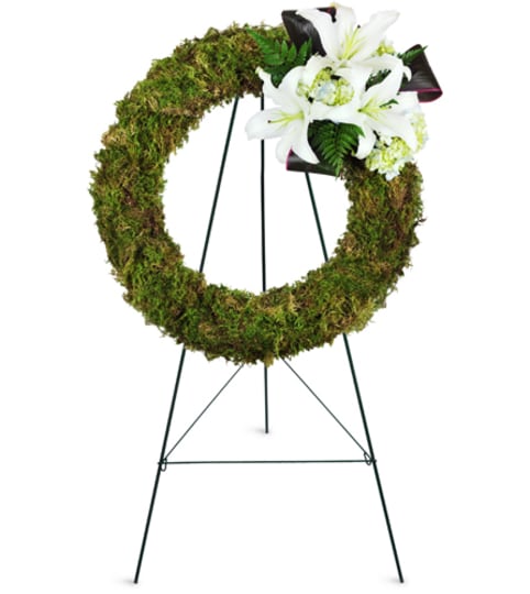 Earth's Jewel Wreath™. An arrangement by Fine's Flowers.