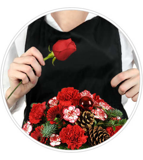 Very Merry Christmas Artist’s Design. An arrangement by Fine's Flowers.
