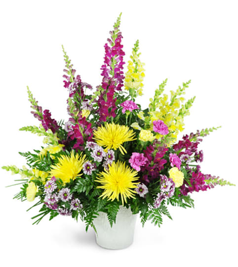 Warm Remembrance. An arrangement by Fine's Flowers.