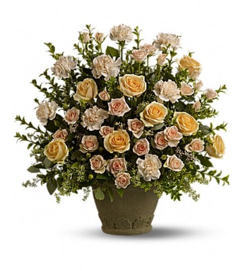 rose rememberance. An arrangement by Fine's Flowers.