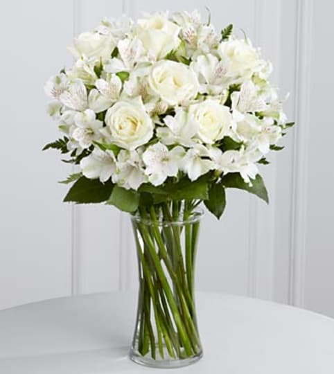 cherished friends. An arrangement by Fine's Flowers.