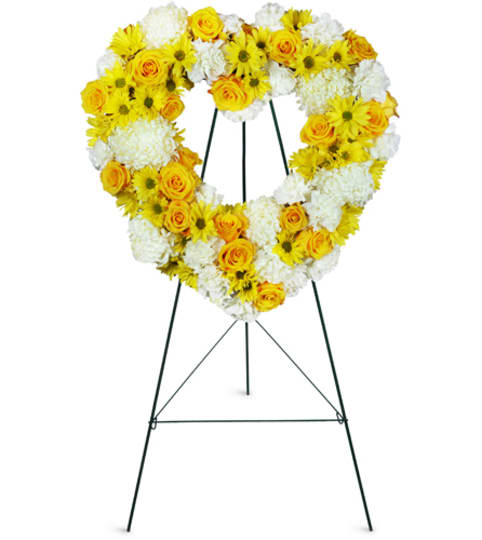 Love is Golden Heart™. An arrangement by Fine's Flowers.