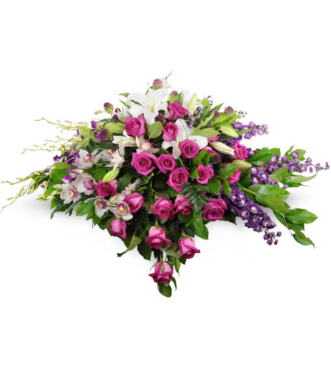 Forever Adored Casket Spray. An arrangement by Fine's Flowers.