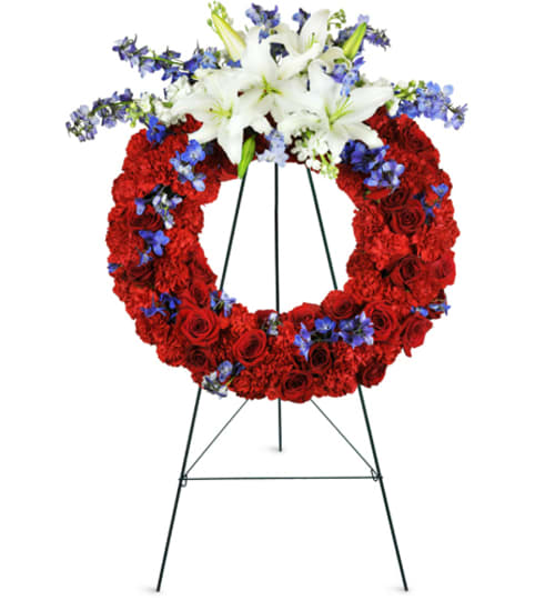 Passionate Grace Wreath™. An arrangement by Fine's Flowers.