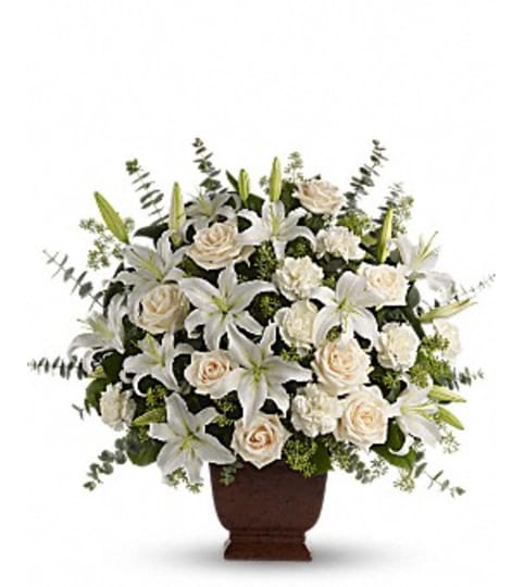 LOVING LILIES AND ROSES. An arrangement by Fine's Flowers.