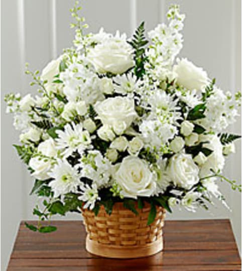 Heart Felt Condolences. An arrangement by Fine's Flowers.