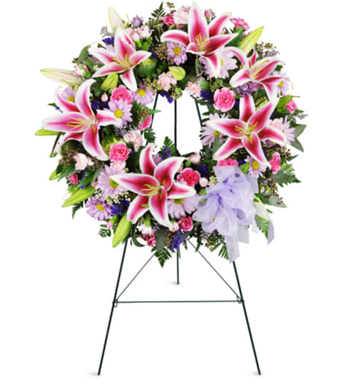Stargazer Sentiments Wreath™. An arrangement by Fine's Flowers.