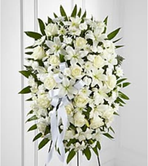 elegant white blooms. An arrangement by Fine's Flowers.