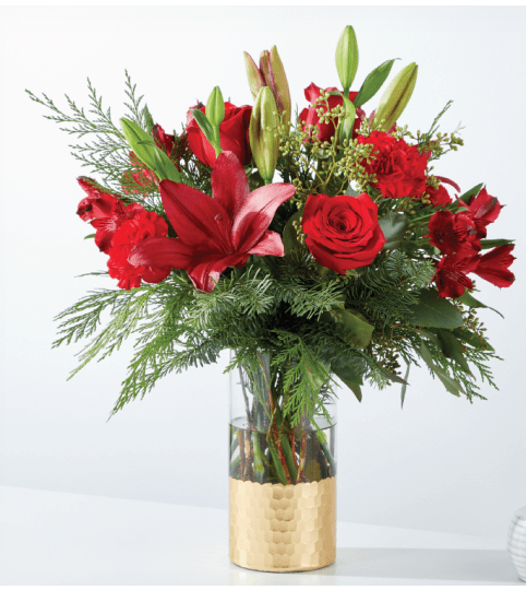 Tidings of Joy FTD C1. An arrangement by Fine's Flowers.
